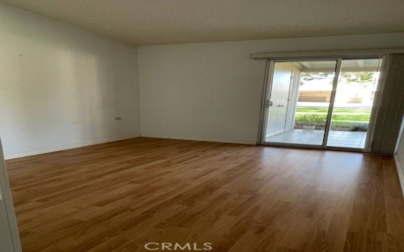 Bedroom with patio doors provides lots of natural light.