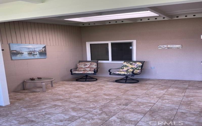 Tile patio provides open air space for relaxing.