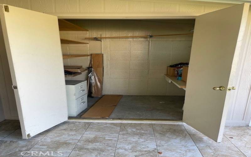 Large storage closet on patio.