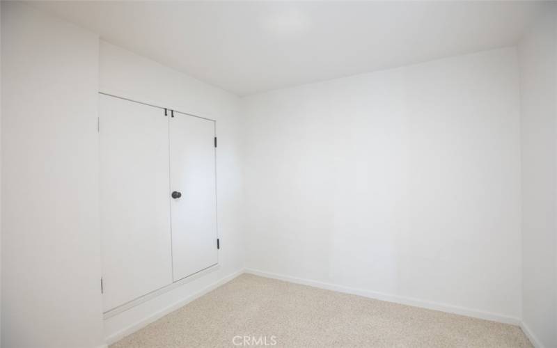 Large adjacent room that could serve as an office or convert to large walk in closet