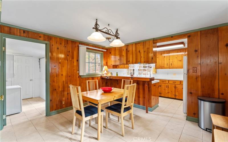 Dining area with breakfast bar.