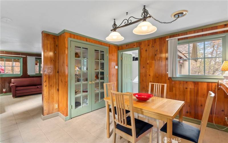 2nd view of dining room with built in cabinets for your cookbooks and dishes.