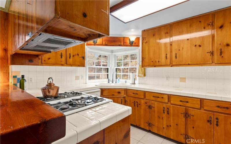 Kitchen with lots of cabinets and counter space.