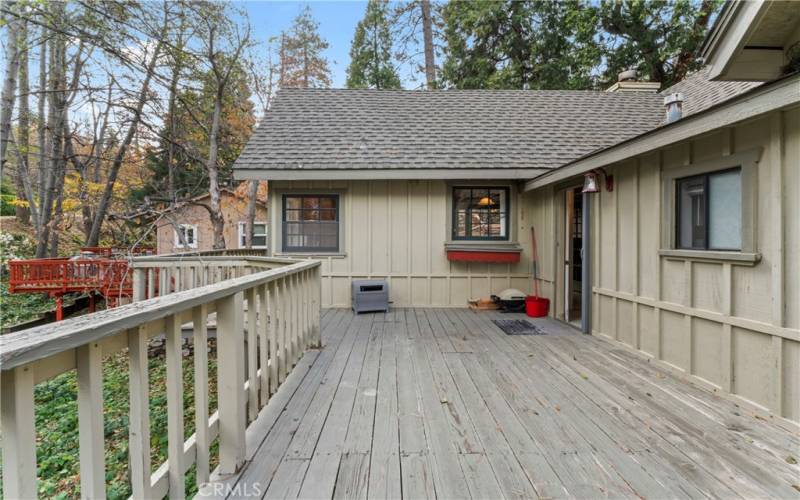 View of back of house and deck.