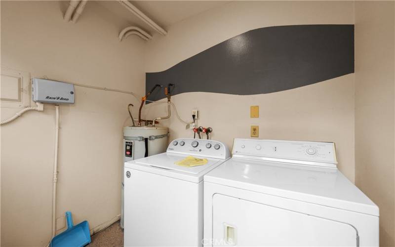 Shared community laundry area with only 4 neighbors. Next to your garage & a short walk from your home.