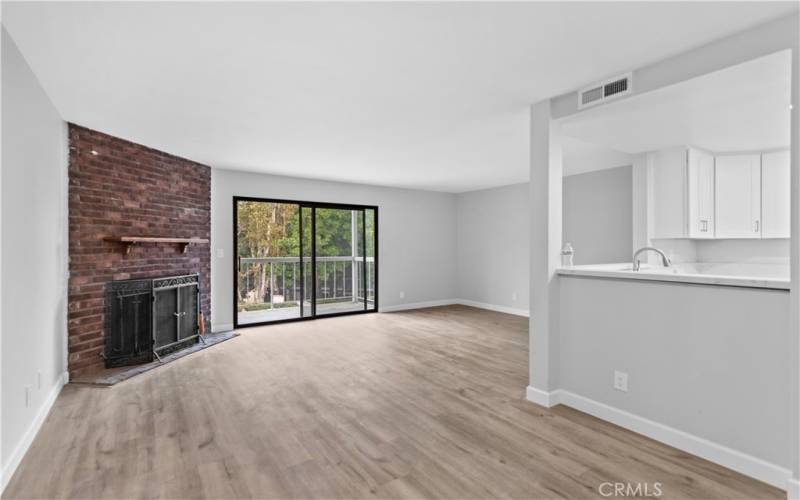 Kitchen opens to Living and Dining Rooms