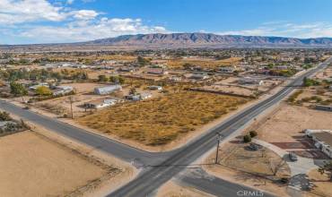 Flat corner lot with Mountain views!