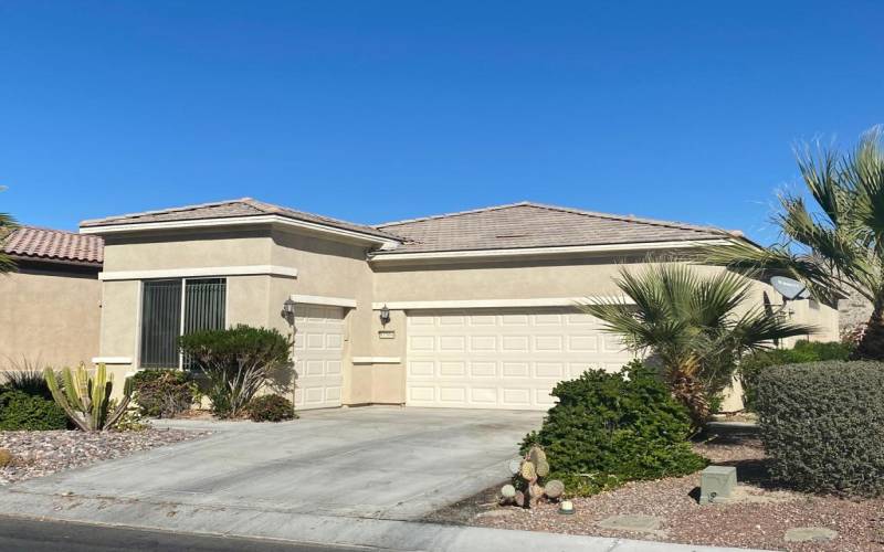 Front of house with cart garage