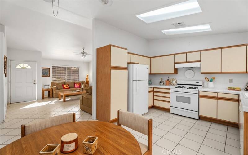 Light and bright this kitchen includes the refrigerator.