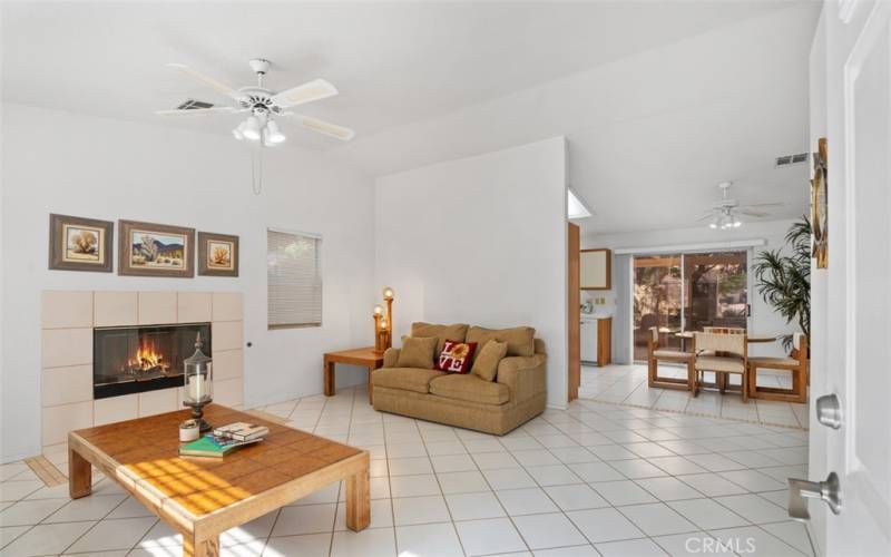 This open, bright living space flows into the dining area.