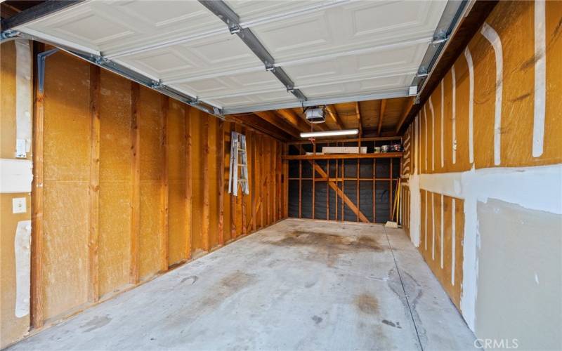 Deep garage with storage and lighting