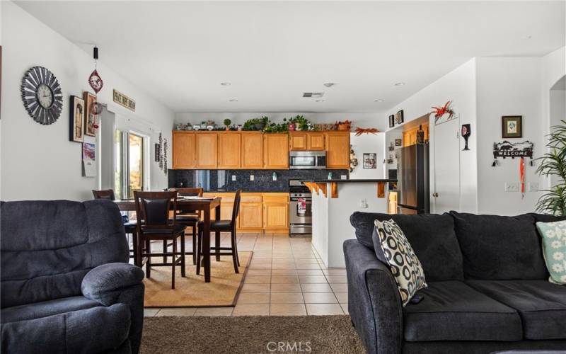 Opening kitchen, kitchen dining and family room.