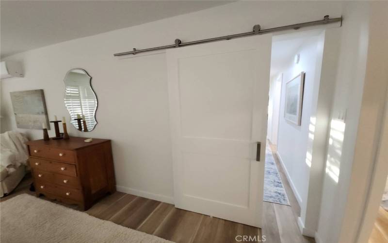 Bedroom Barn Door leading to Hallway.