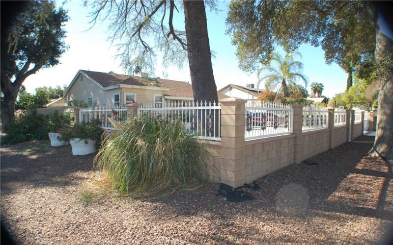 Block and wrought iron fence