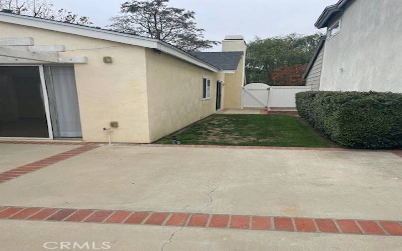 Patio and side looking toward front of house