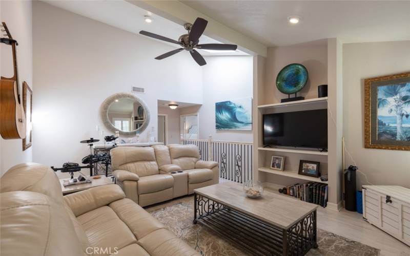 Head upstairs to a huge separate family room perfect for movie night...