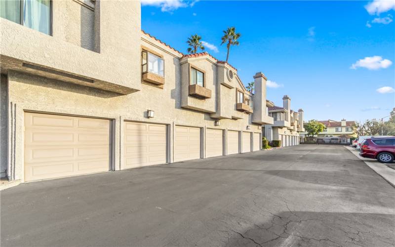 Middle garage #18 goes with the unit and one additional assigned parking spot.  Gated community