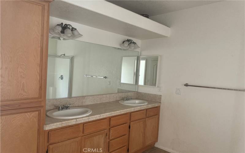 Primary Suite Bathroom with dual vanities