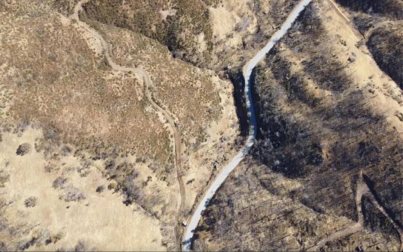 Aerial shot of property on left of Mines rd