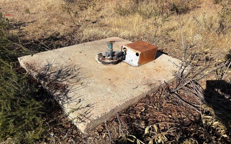 Abandoned well with melted fire damaged seals