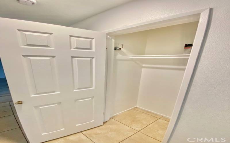 Hallway closet, perfect for additional storage.