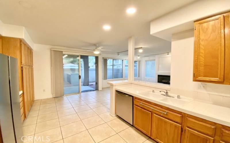 View from kitchen to dining and living room space.