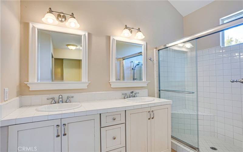 Primary bath with dual sinks and walk-in Tub/Shower