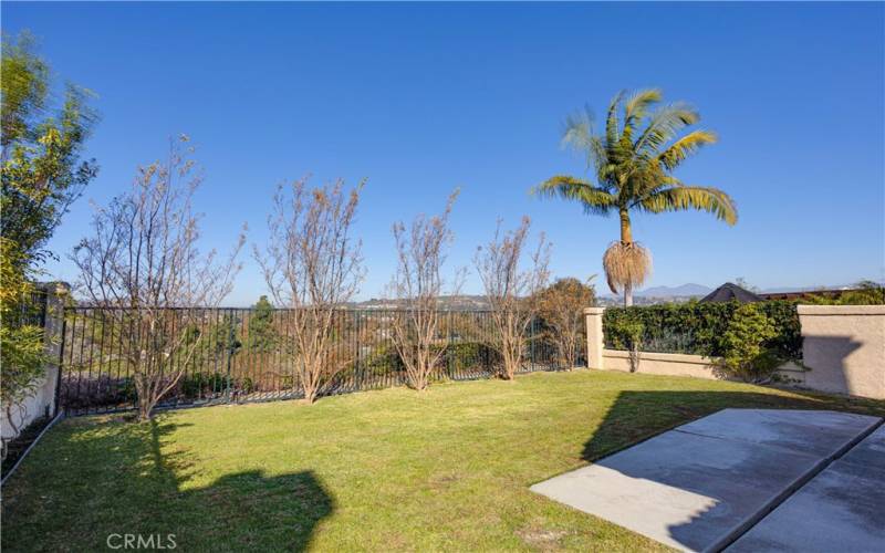 Cement Patio for a Large Patio Set and Umbrella