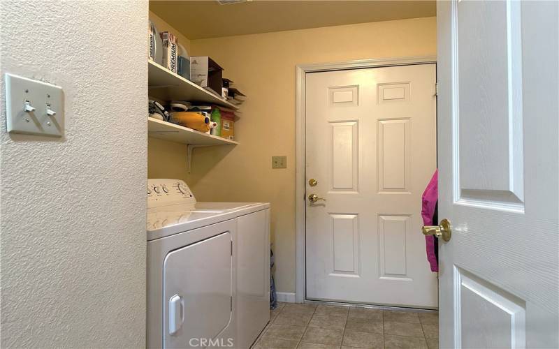 Laundry room and garage access.