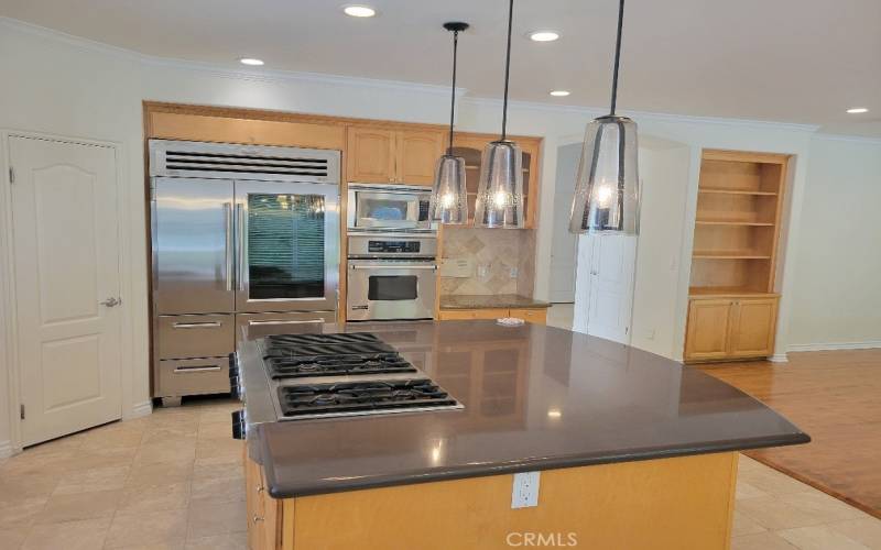 Kitchen with an island and Sub-Zero fridgerator