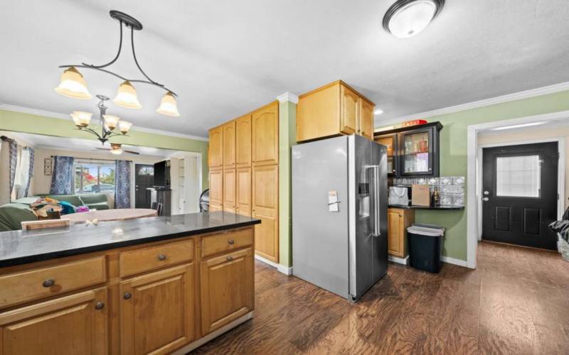 Plenty of storage in wall cabinets. Washer and dryer inside. Laminate flooring.