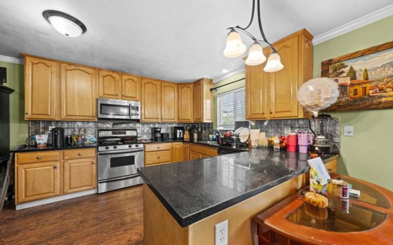 Lots of cabinet space in this kitchen and dining area.