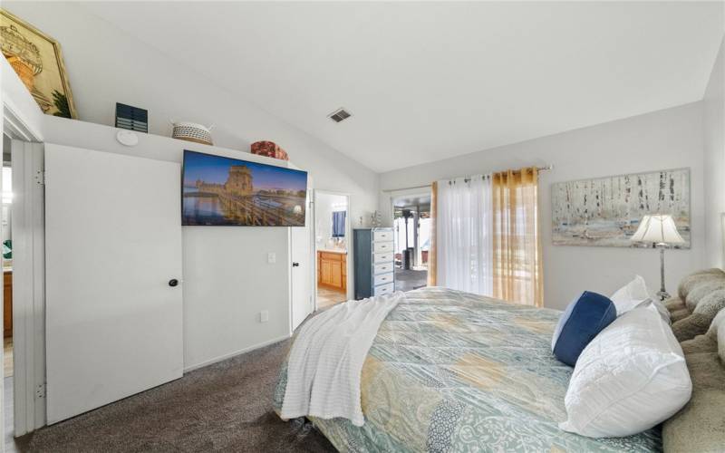 Primary Bedroom Has Backyard Access Through A Sliding Door