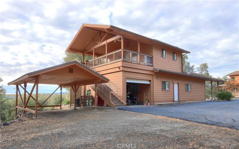 ADU situated above the garage complete with its own carport.