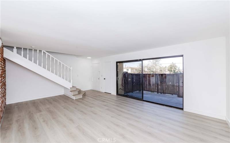 Spacious Living Room. Sliding Door to Enclosed Private Patio.