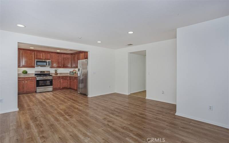 Open floor plan. View of kitchen from dining area.