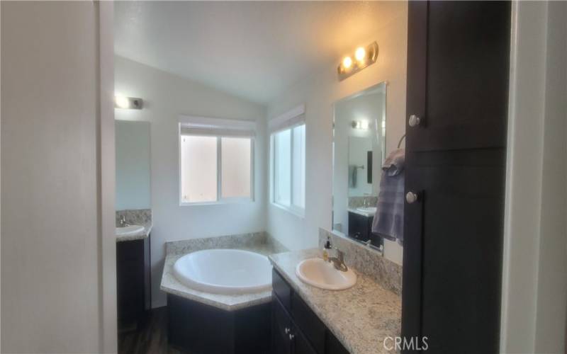  Deep soaking bathtub in the master bathroom.