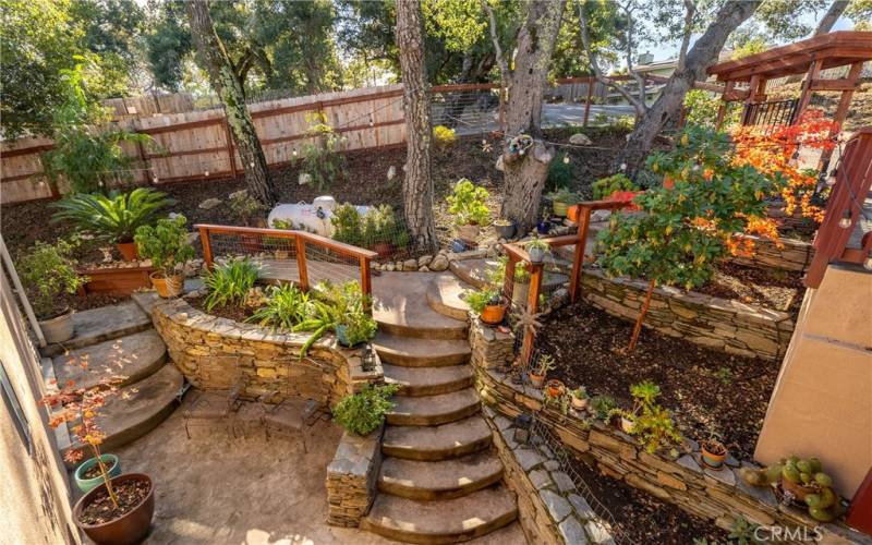 Side yard perfect for relaxing on those beautiful north county days!