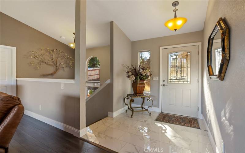 Let's step inside to the beautiful tiled entry way.