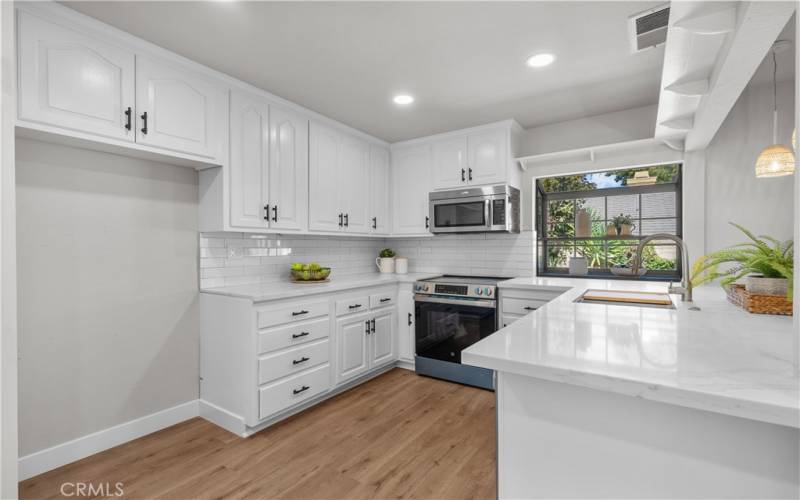 Kitchen with new appliances.