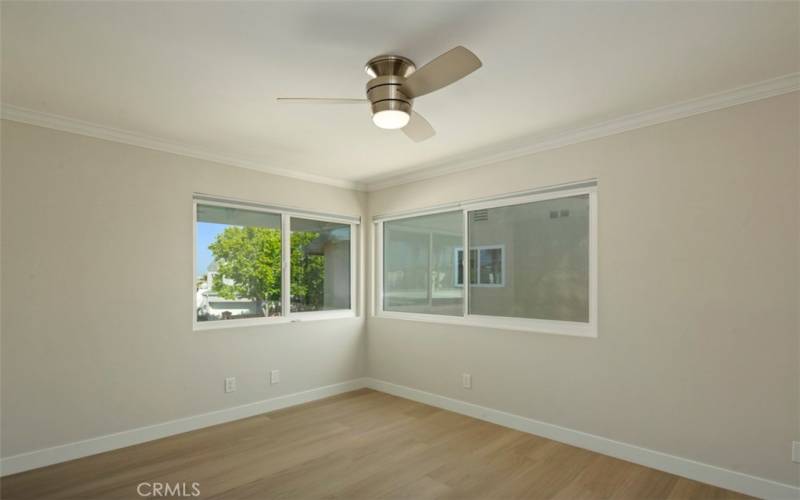 Front bedroom is very large with giant closet to the right. New Windows and Ceiling fan.