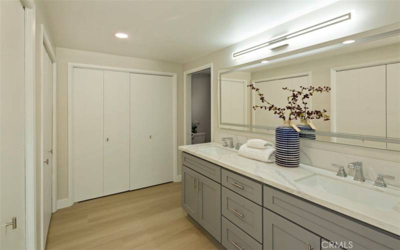 Dual Sinks and closets in the Primary Bath. Main mirror has night shade rear mounted lights.