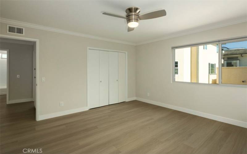 Bedroom #2 in the back of the house. New Pull down blinds and ceiling fans.