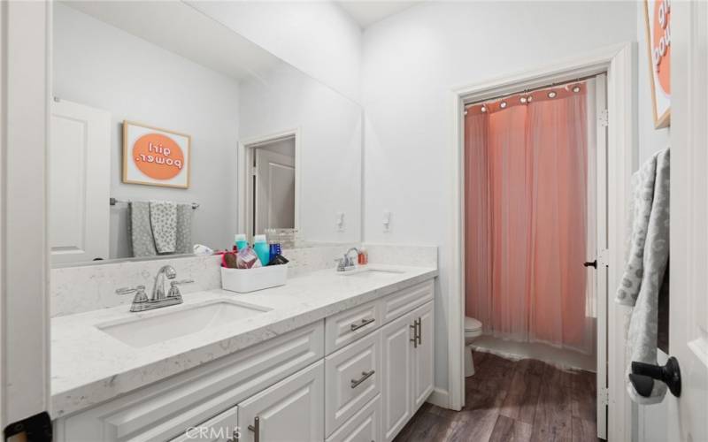 Guest bathroom with dual sinks