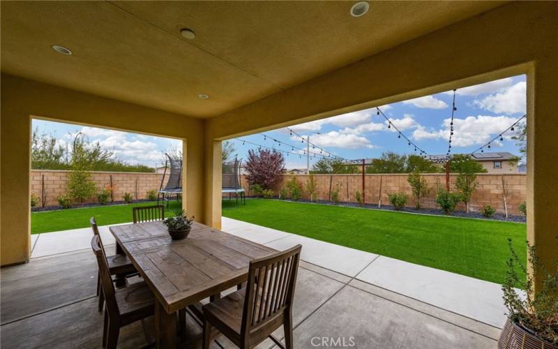 Covered patio with lighting and wired for a fan