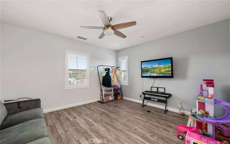 upstairs loft space with large storage closet