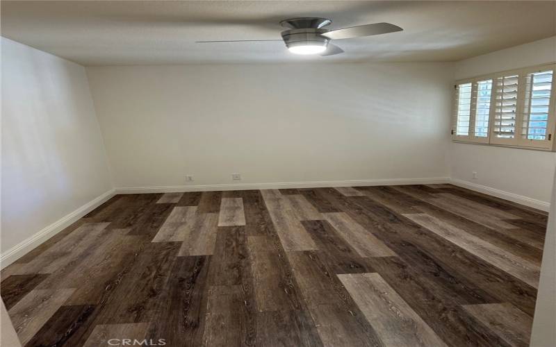 Master bedroom with wood floors