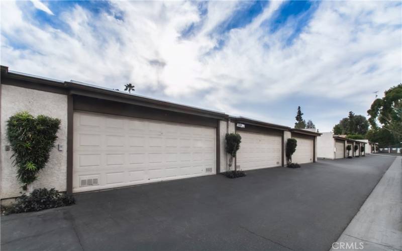 Private detached 2 car garage with shelving. #97