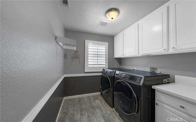 Laundry room located upstairs