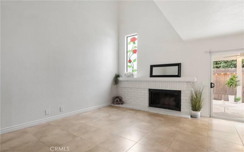 Living Room with  High Ceilings and Sliding Doors to the Back Patio